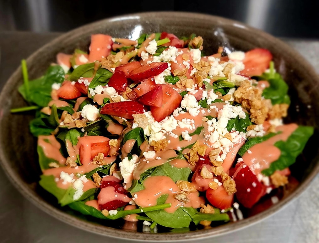 Strawberry spinach salad with local goat cheese — FORC Restaurant